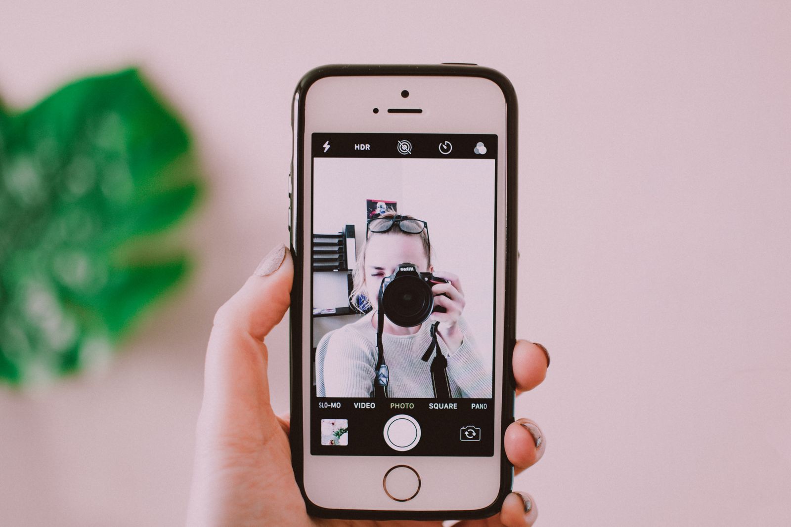 Person holding and using an iPhone